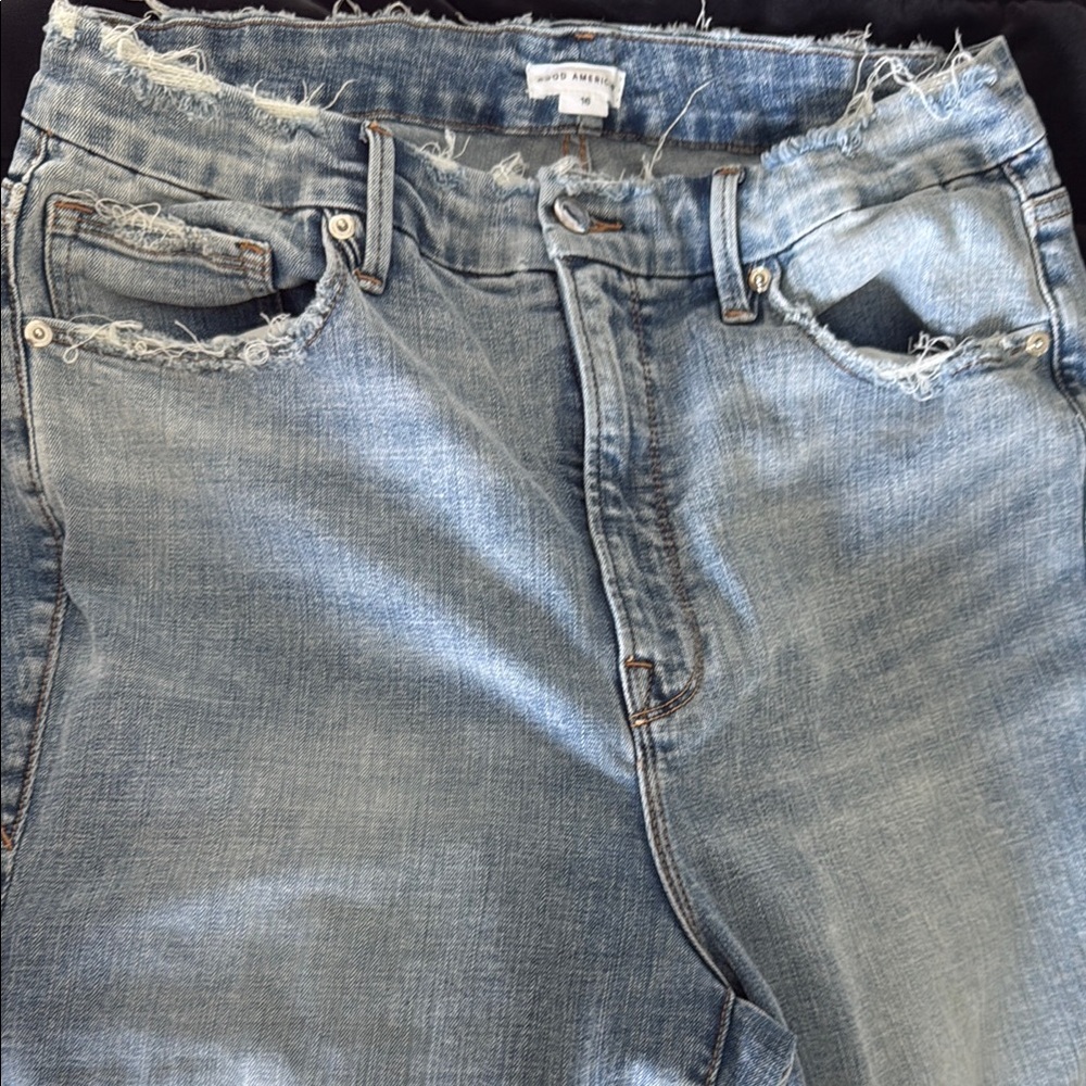 Good American distressed blue jeans